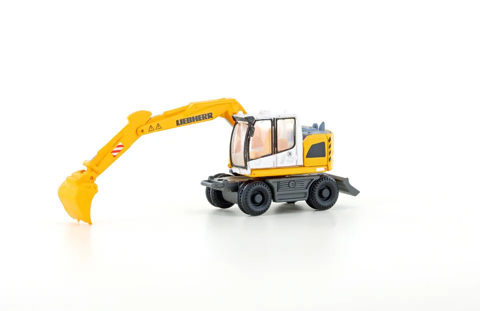 hobbytrain-modellautos-liebherr-compact-bagger-modellauto-n-tiefl-ffel image 1